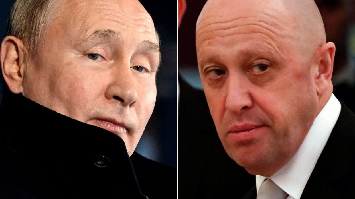 2023/06/230204073944-putin-yevgeny-prigozhin-split.jpg