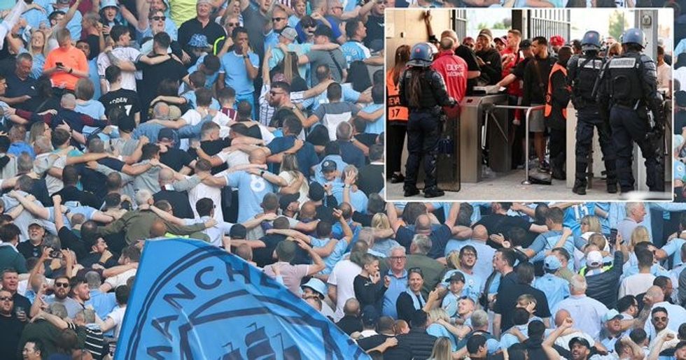 2023/06/man-city-fans.jpg