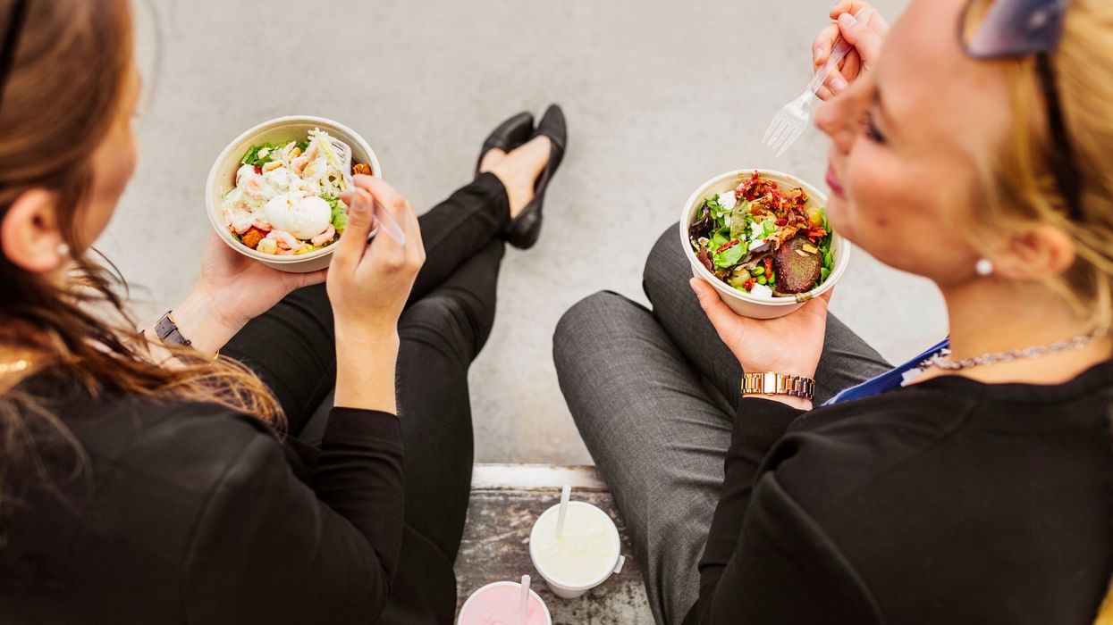 2023/08/high-angle-view-of-two-women-eating-salad-2022-02-02-03-56-37-utc-1-scaled.jpg