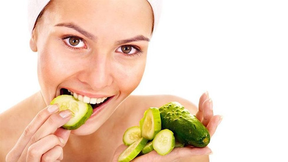 2023/09/women-eating-cucumber-123.jpg