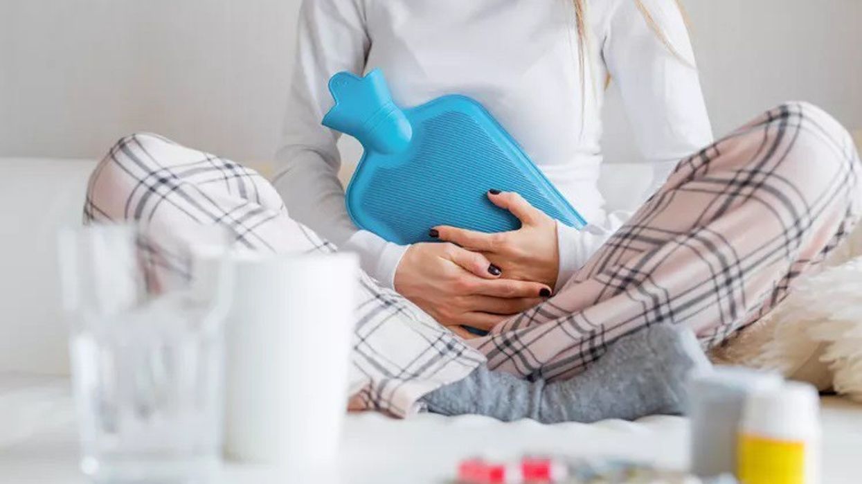 2023/12/woman-with-hot-water-bottle-Getty-Images_edited.jpg