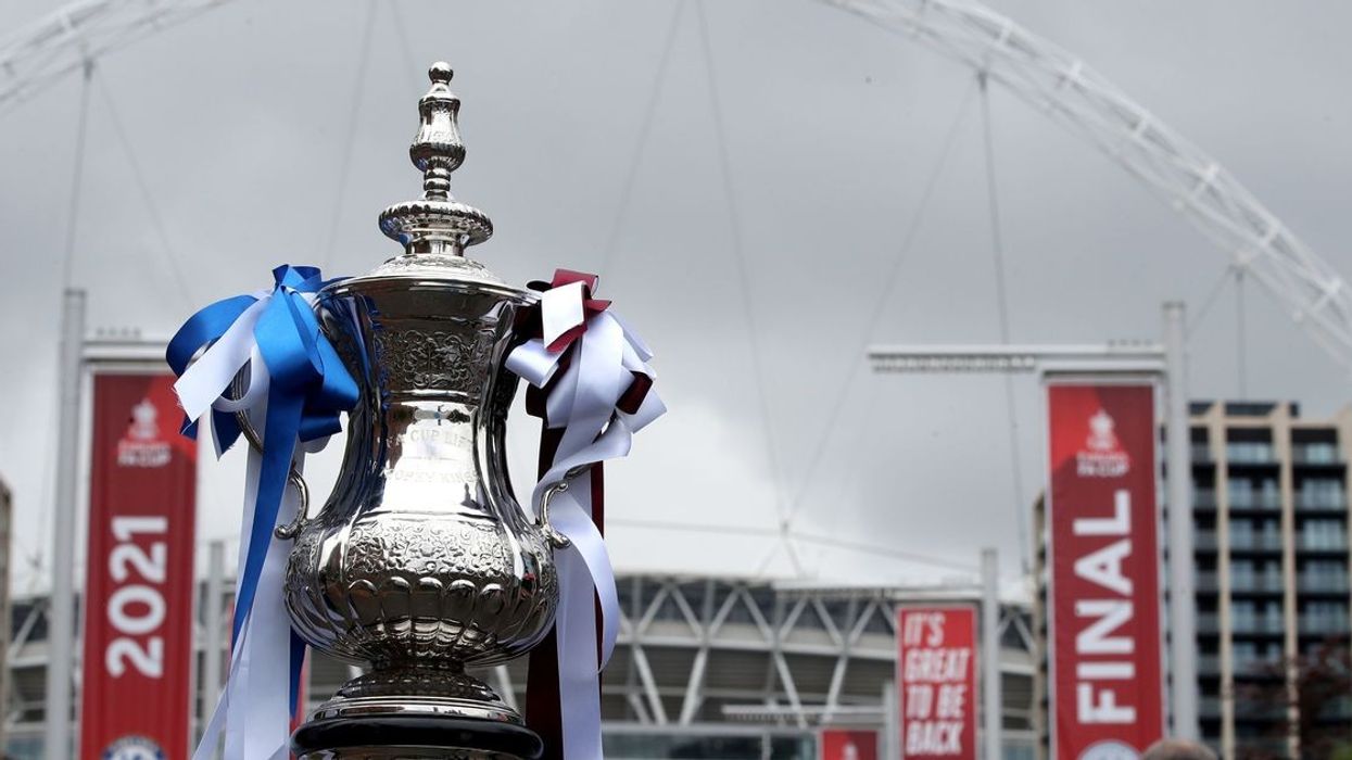 2024/01/0_A-replica-of-the-trophy-on-display-outside-Wembley-Stadium-London.jpg