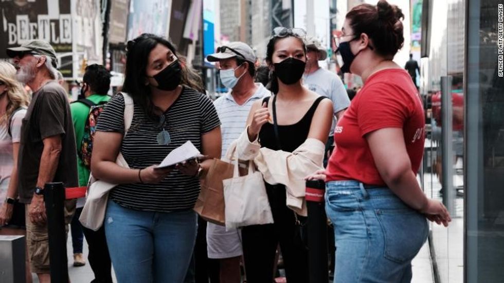 211029054205 covid us masks broadway 091421 file exlarge 169