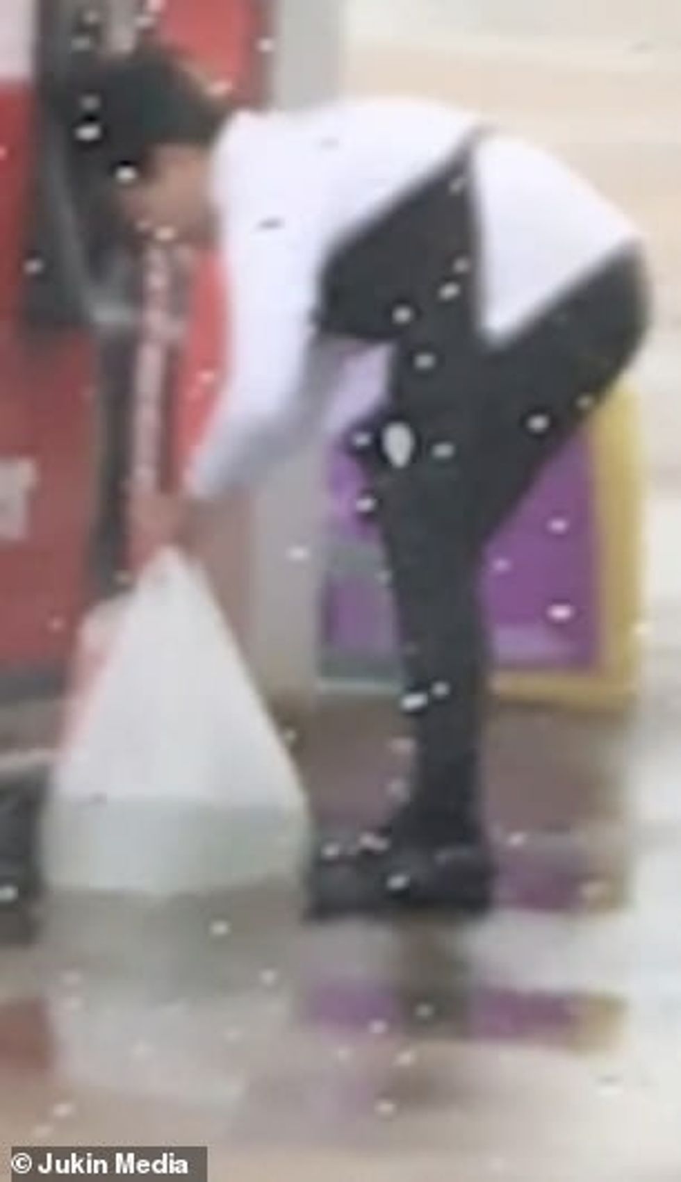 22143240 7784271 She hastily ties the handles together before putting the bundle a 51 1576142552950