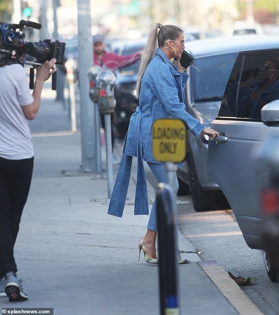 23753140 7918947 Khloe s look Khloe doubled down on the denim for her outing with m 37 1579769255453