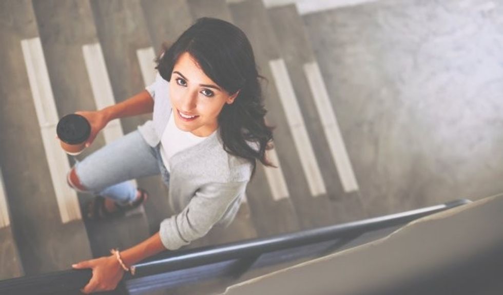 239302 veybeportrait lovely brunette walking stair 450w 421716127 f