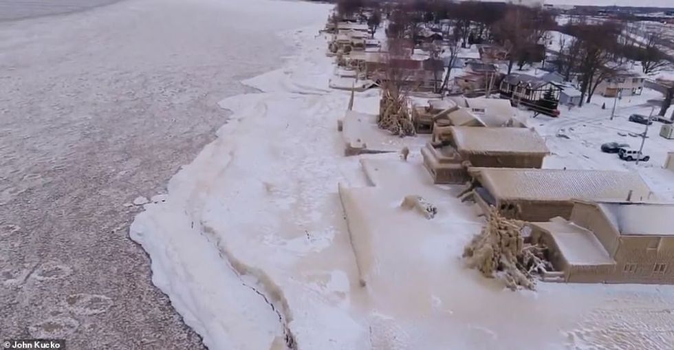 25391952 8062153 This aerial view shows how Lake Erie froze near the shore and ho a 5 1583076777739