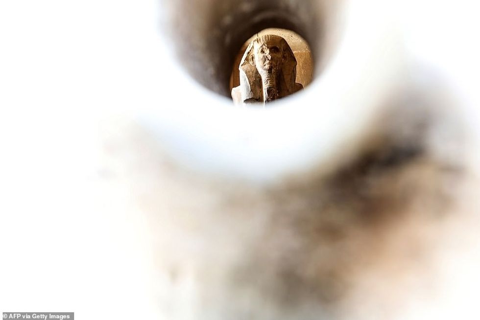 25618114 8079495 Pictured Djoser statue is pictured inside the step pyramid of Dj a 23 1583492089083