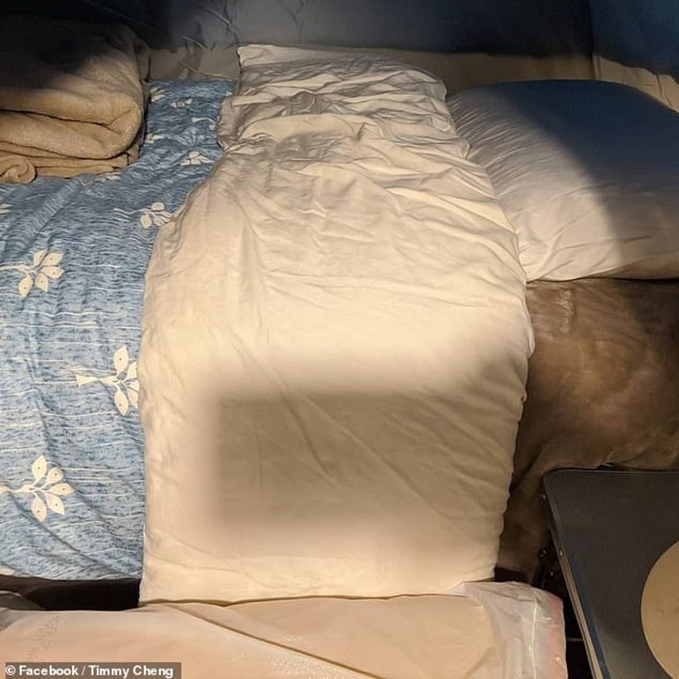 26528186 8163289 Inside the tent Dr Cheng has a twin mattress as well as other be a 57 1585425784716