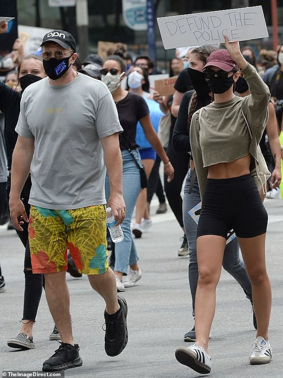 29147994 8382289 Defund the police The 28 year old held up a sign that read defun a 4 1591148091029