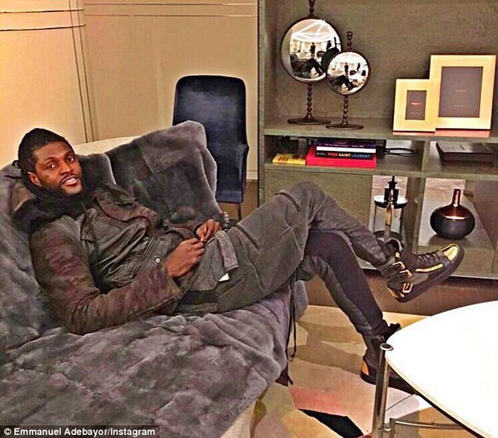 305E61C900000578 3408110 Emmanuel Adebayor relaxes at his London home after a hard day at a 39 1453287383857
