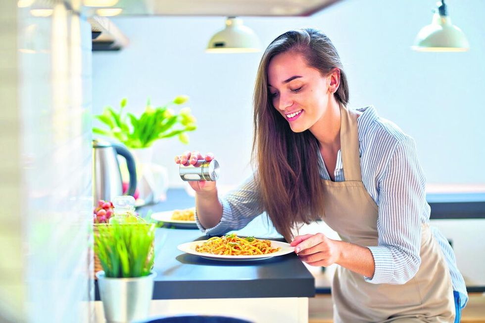 309673 stockphotosmilinghappyjoyfulcutecookingwomanhousewifesaltsan