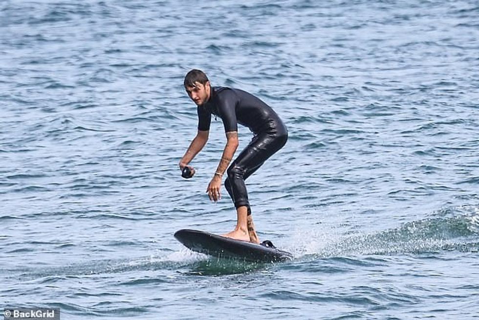 32301744 8657361 High flying The model showed off some balancing skills out on th a 32 1598248926830