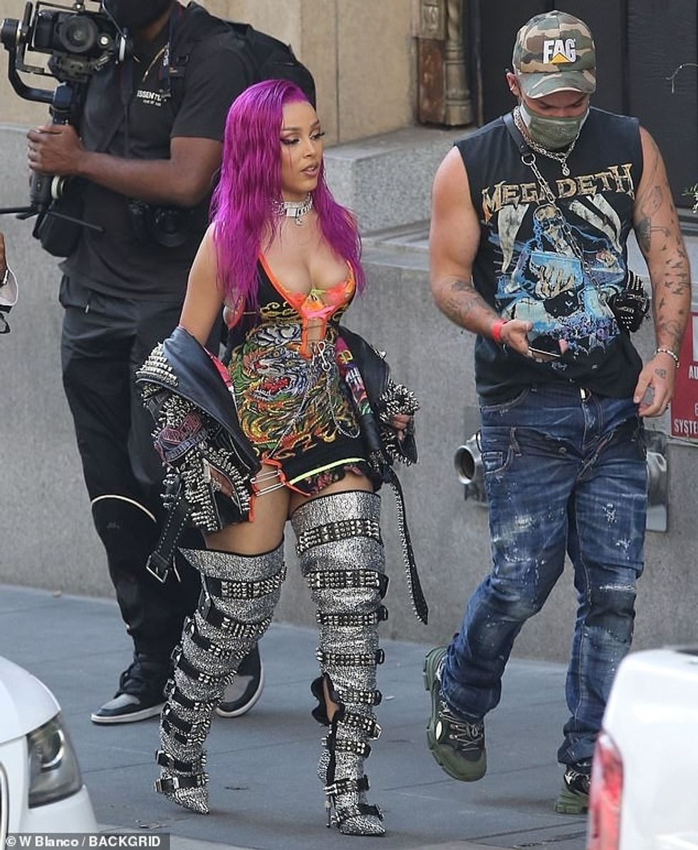 33580414 8769301 Biker babe The five foot three singer wore a reworked Ed Hardy s a 7 1600968264966