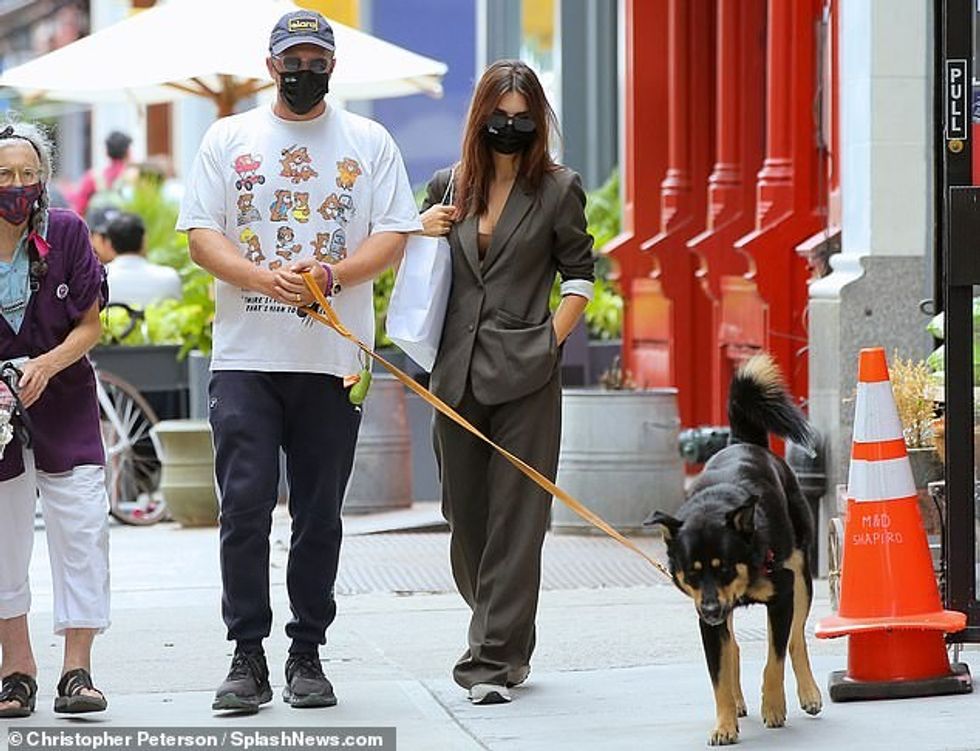 33660888 8776443 Androgynous chic The 29 year old wore the sleeves of the buttone a 3 1601155470408