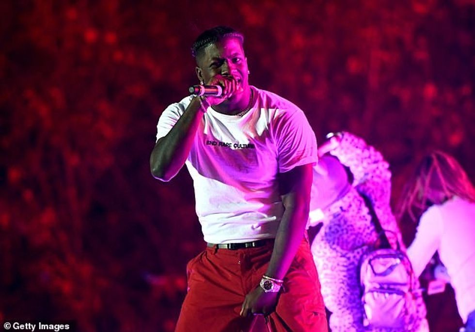 33738098 8783003 Need for speed The rapper was driving a white Ferrari when he wa a 11 1601334609850