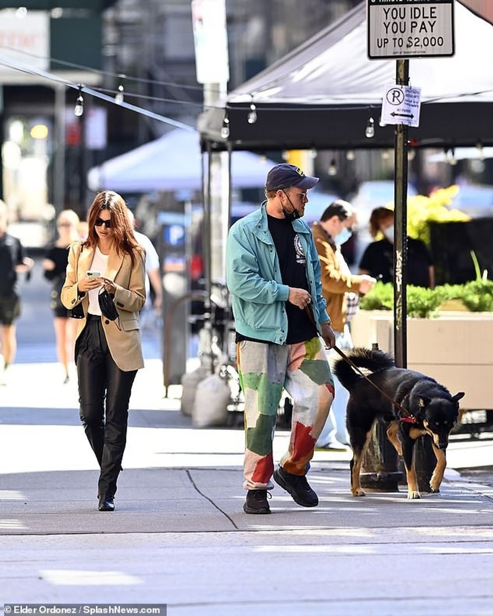 33944288 8802079 Catching up Emily kept her eyes shielded from the bright sun wit a 8 1601753939198