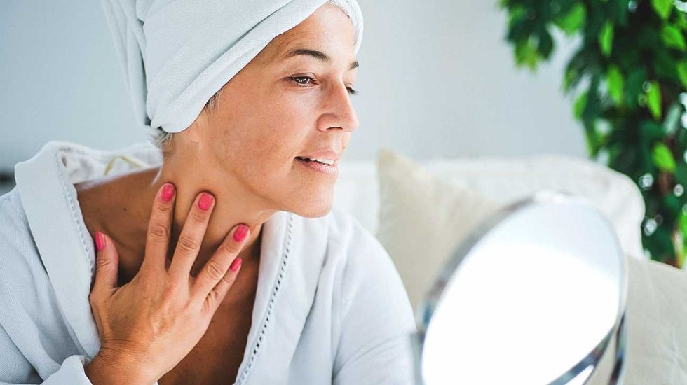 3453 woman examine skin header