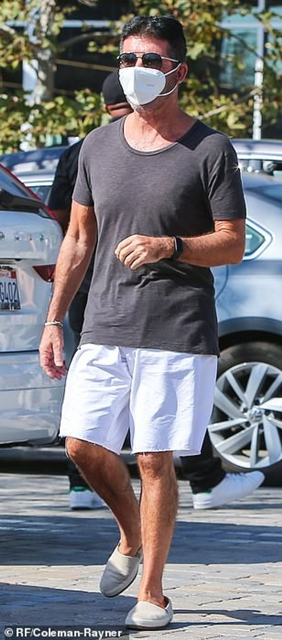 34574832 8855643 Looking good He sported a charcoal coloured top plimsolls and a m 95 1603118651135