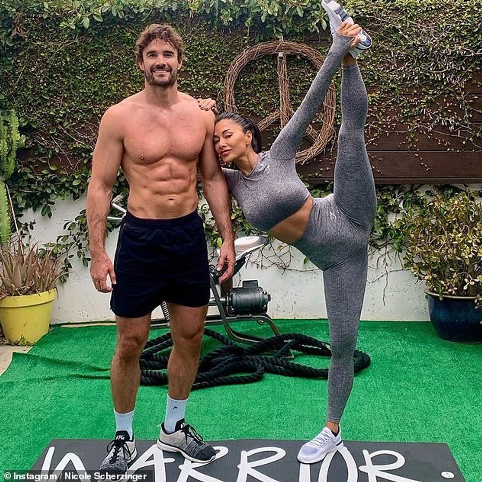 34682740 9361943 Working up a sweat Nicole Scherzinger and Thom Evans appeared st a 12 1615767693658