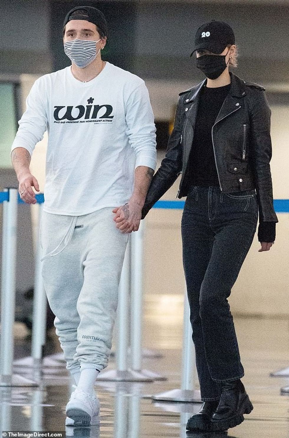 35454790 8928089 Keeping it casual The 21 year old wore a long sleeve white Peace a 113 1604893851126