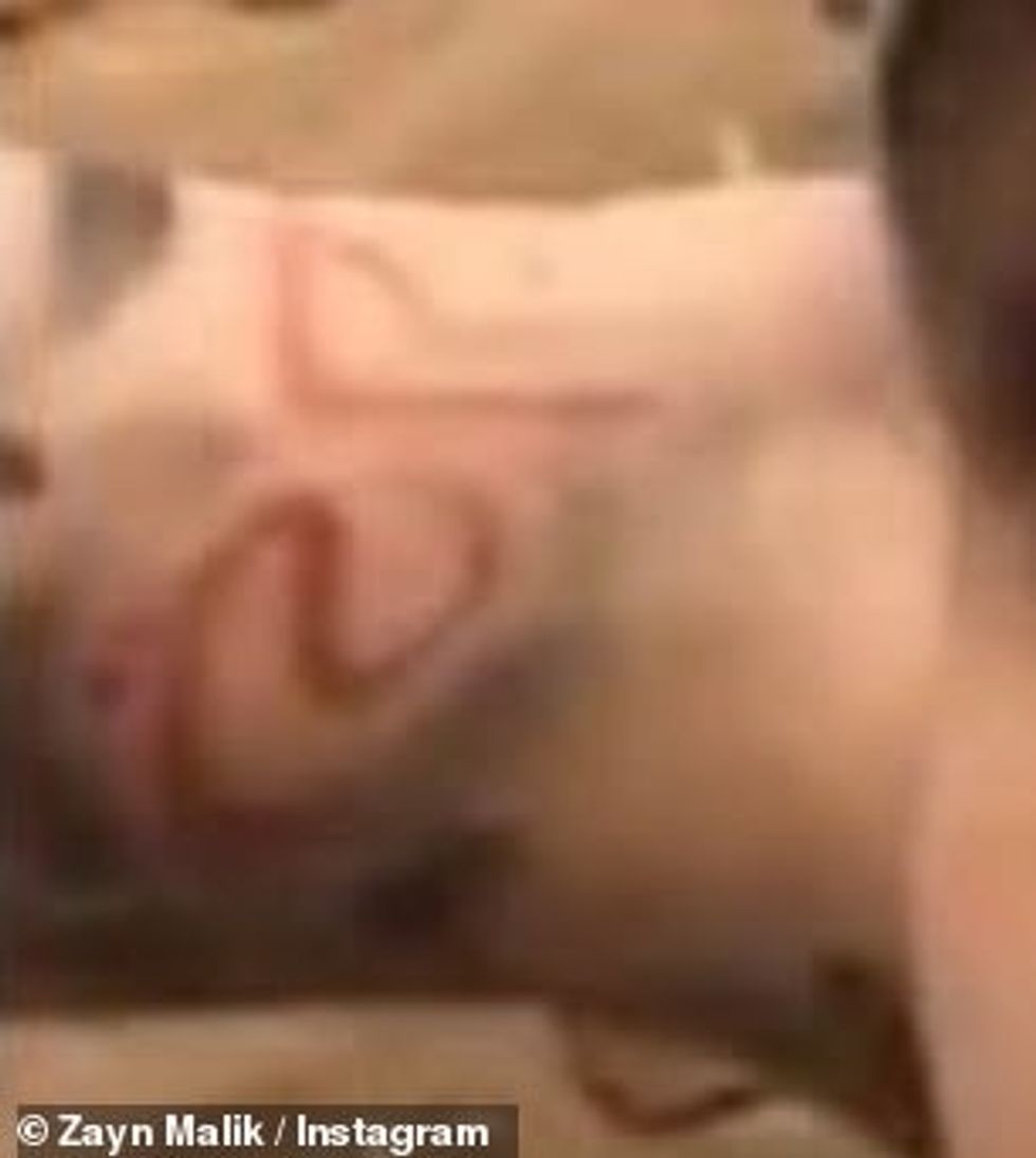 38466072 9185821 Spotted Eagle eyed fans captured the red ink on the wrist of the a 45 1611628066704