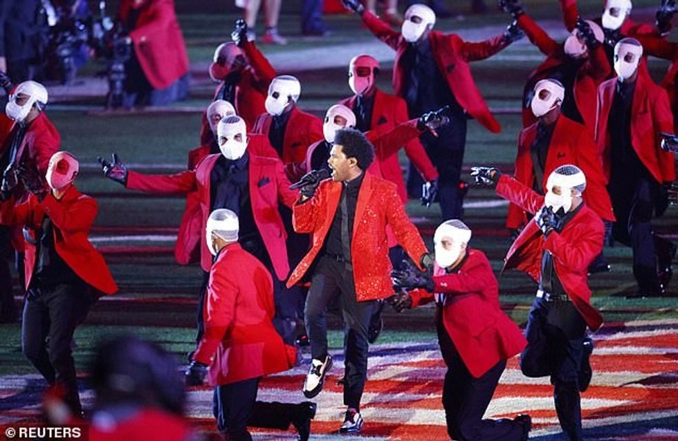 39022758 0 Extravaganza The Weeknd was surrounded by masked dancers and a r a 13 1612822366575