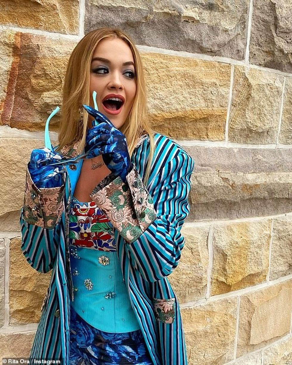 39841270 9307379 The clash The singing sensation posed against a stone wall in a a 13 1614457690769