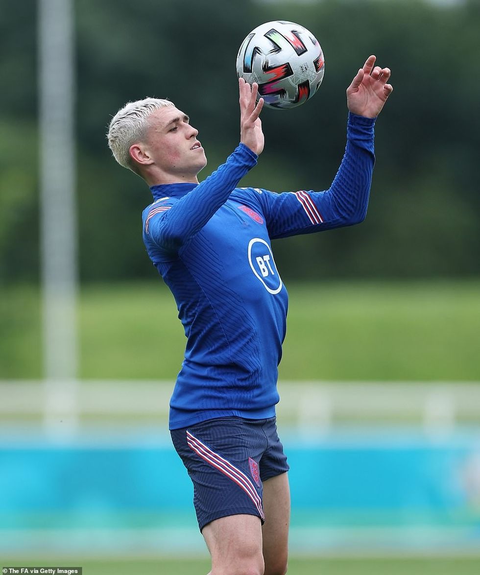 45271471 9775479 Manchester City midfielder Phil Foden 21 trained with the squad m 27 1625916349834