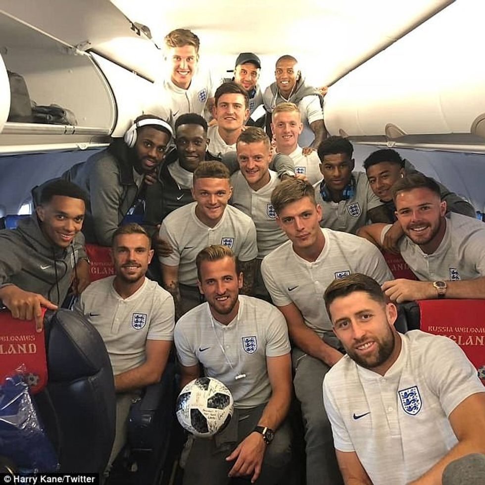 4D973EA800000578 0 Harry Kane bottom centre poses with his signed match ball alongs a 15 1529862139940