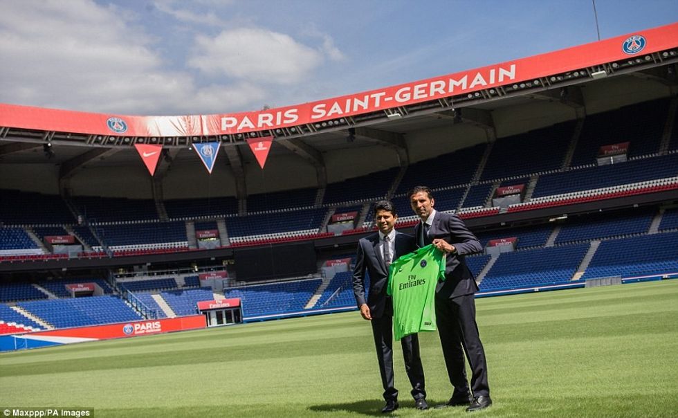 4E10144400000578 5934027 Al Khelaifi and Buffon smile for the cameras as they hold up the a 12 1531149360284