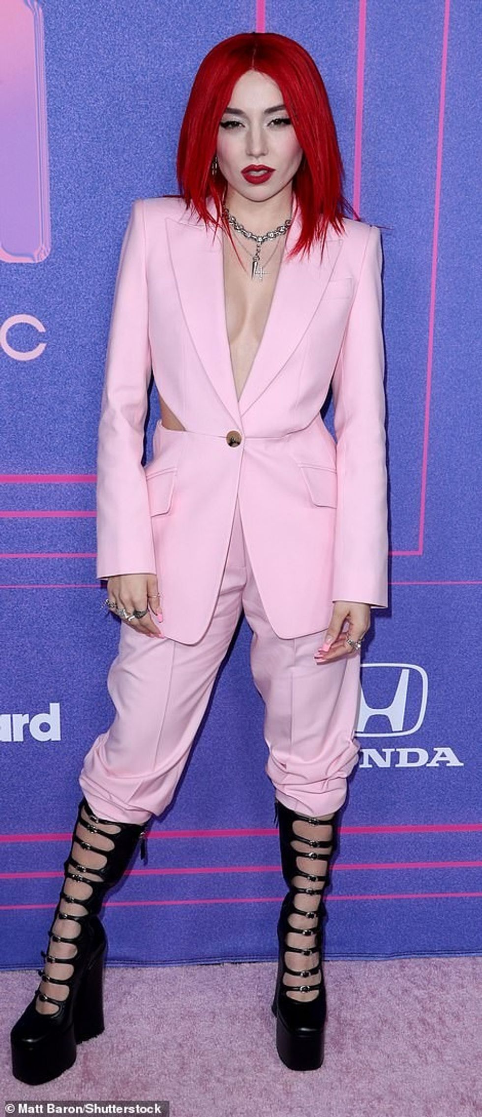 54886605 10571797 Powerful She donned a pale pink power suit a 436 1646279753594