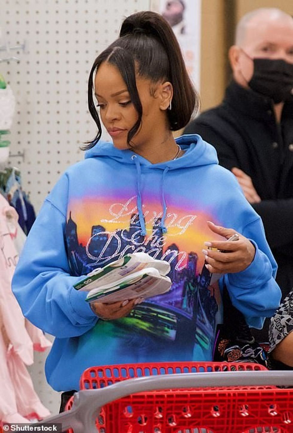 55494907 10625633 Cozy Rihanna scoured the aisles of the popular department store a 50 1647560469760