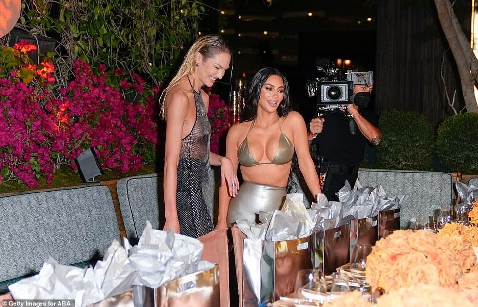 55571831 10631987 Mingling Candice and Kim were spotted sharing a laugh at the eve a 149 1647764905725