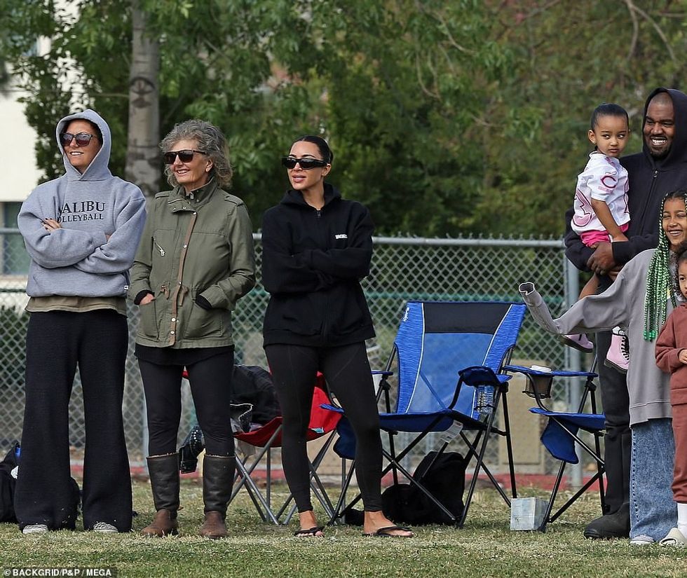 55872789 10657881 A bit of space between them Kim was with two other women as Kany a 80 1648420115920