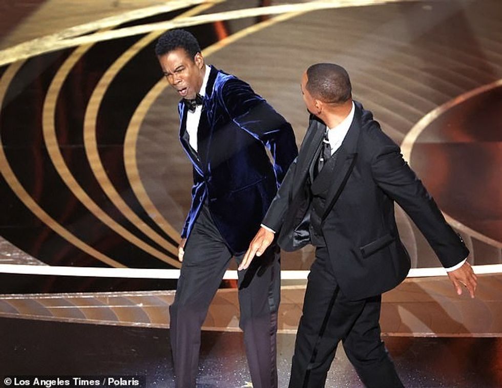 55885097 10661391 The slap Moment Will Smith stormed the stage at the 94th Academy a 2 1649179746763