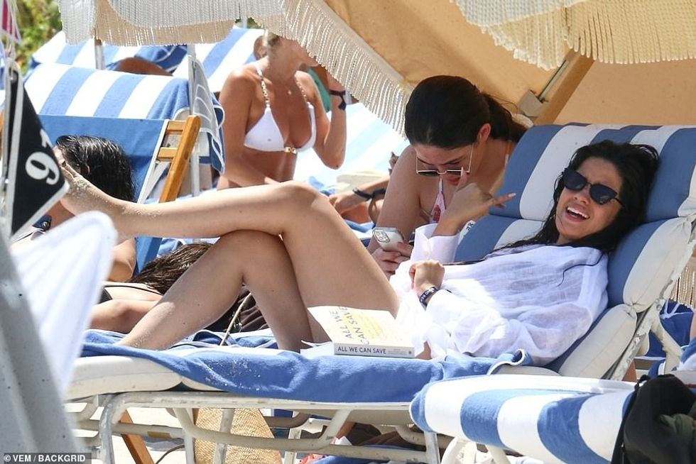 56137195 10679923 Intellectual She kept herself occupied with a book called All We a 14 1648932713350