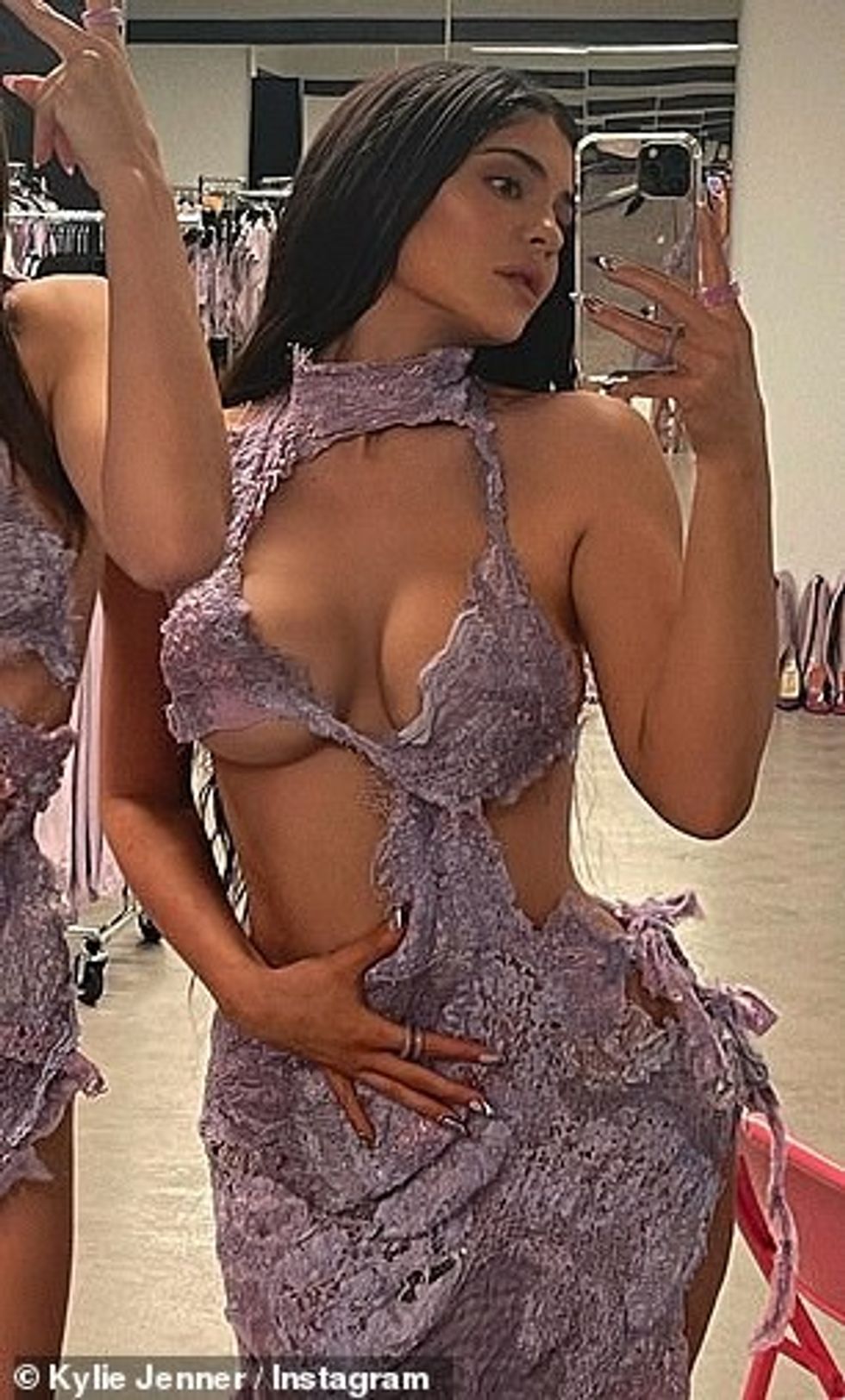 56314579 10694137 Busty Kylie Jenner showed off her generous cleavage in a plungin a 112 1649300522179
