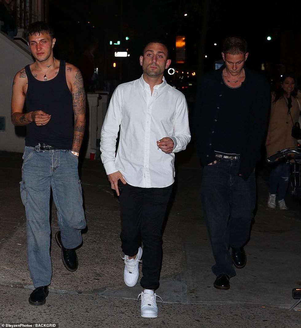 56975881 10747595 Trio The trio made their way into the venue with Marc keeping hi a 103 1650794032629