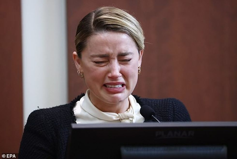 57460513 10789317 Amber Heard broke down on the stand Thursday as she detailed how a 60 1651838596579