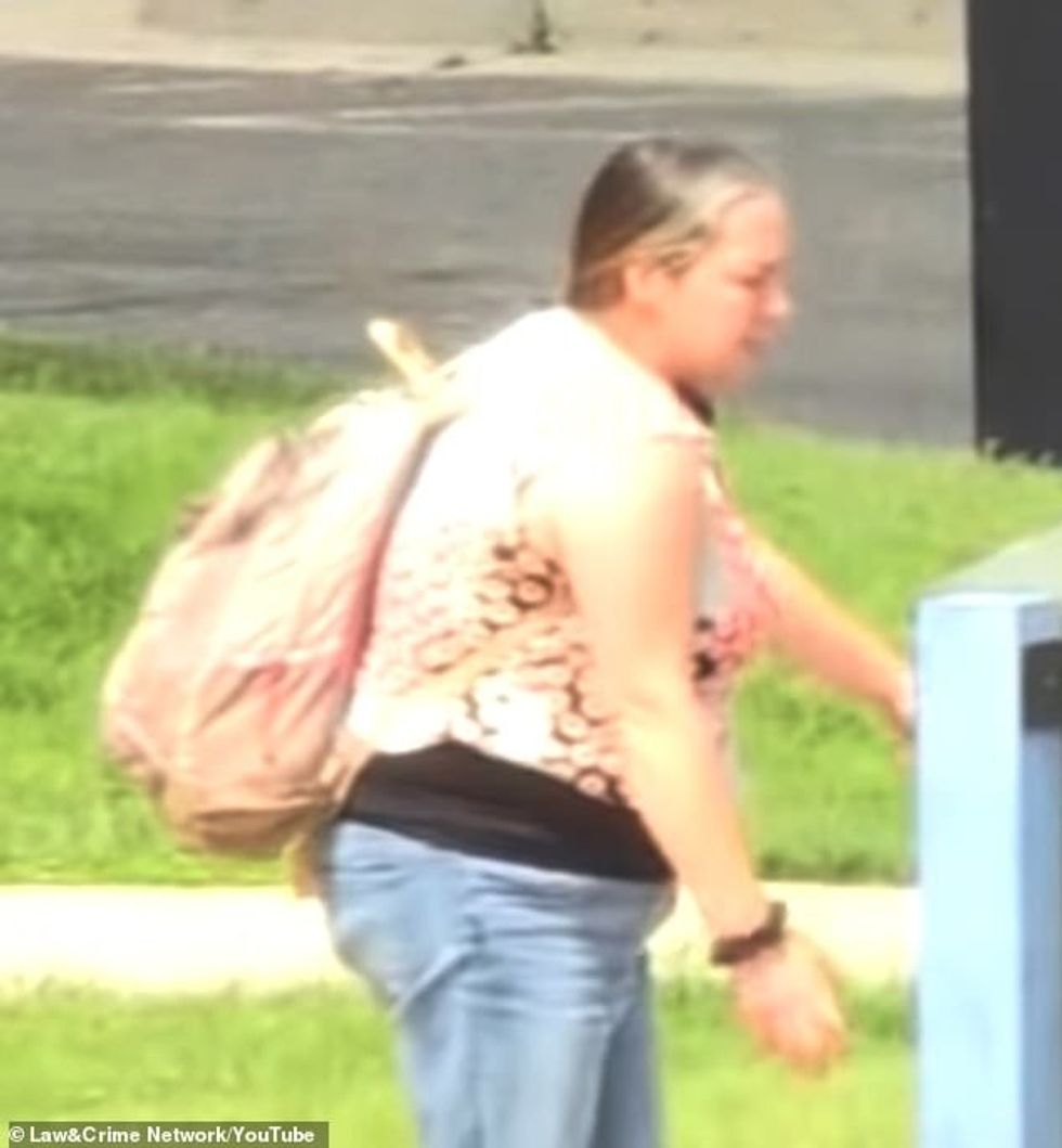 58202685 10847857 The woman s pictured left outburst came during a break after Jud m 3 1653371577001