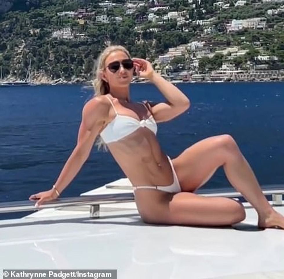 59195477 10927419 A female companion Also with the star is his 25 year old fitness m 39 1655475373949