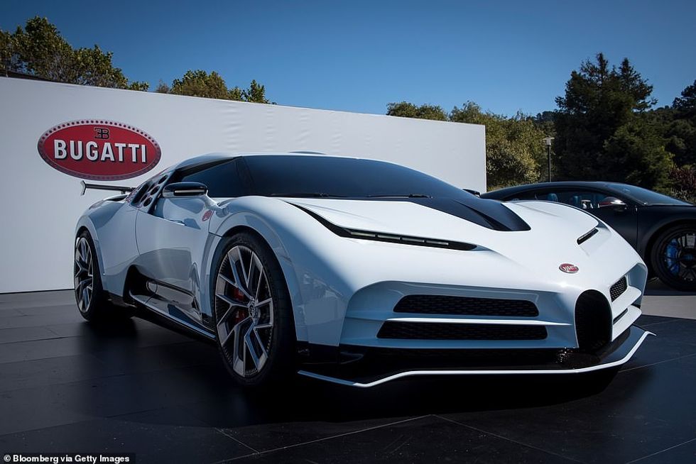 59200261 10975915 Splashing the cash Ronaldo had his 8 5m Bugatti Centodieci as we a 5 1656774941533