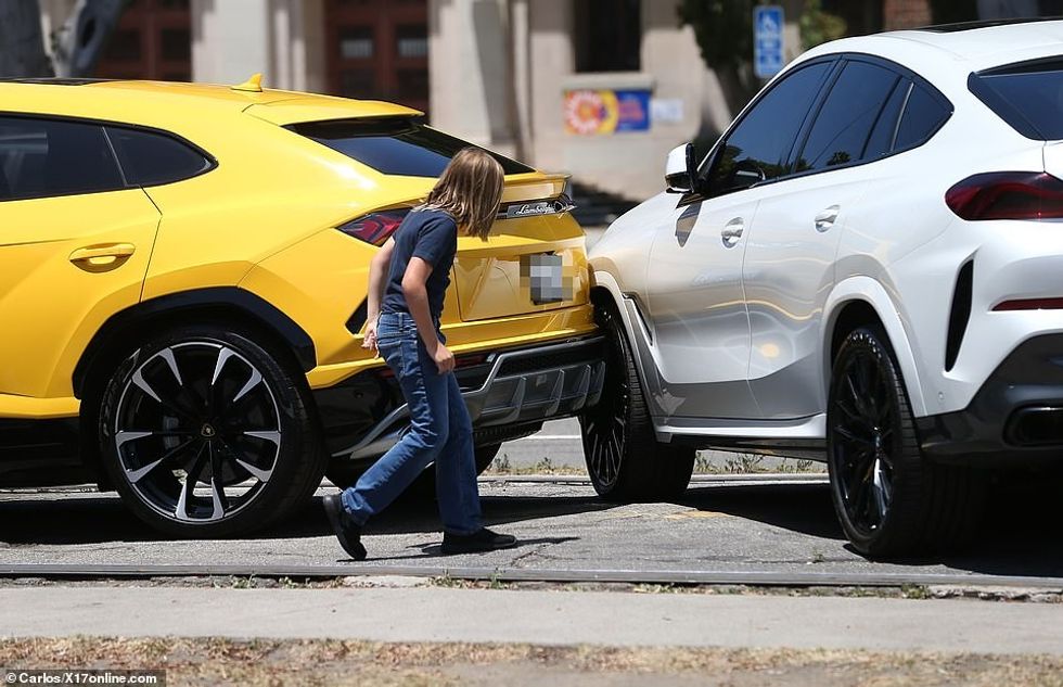 59558071 10955661 Checking Samuel got out of the car and checked out the spot wher a 18 1656321995098