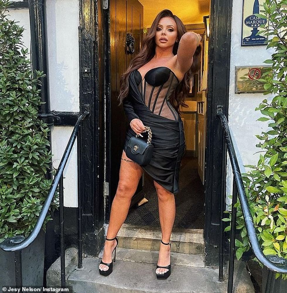 59640953 10962781 Wow Catching the eye in the black number Jesy wowed in the one s a 46 1656451290360
