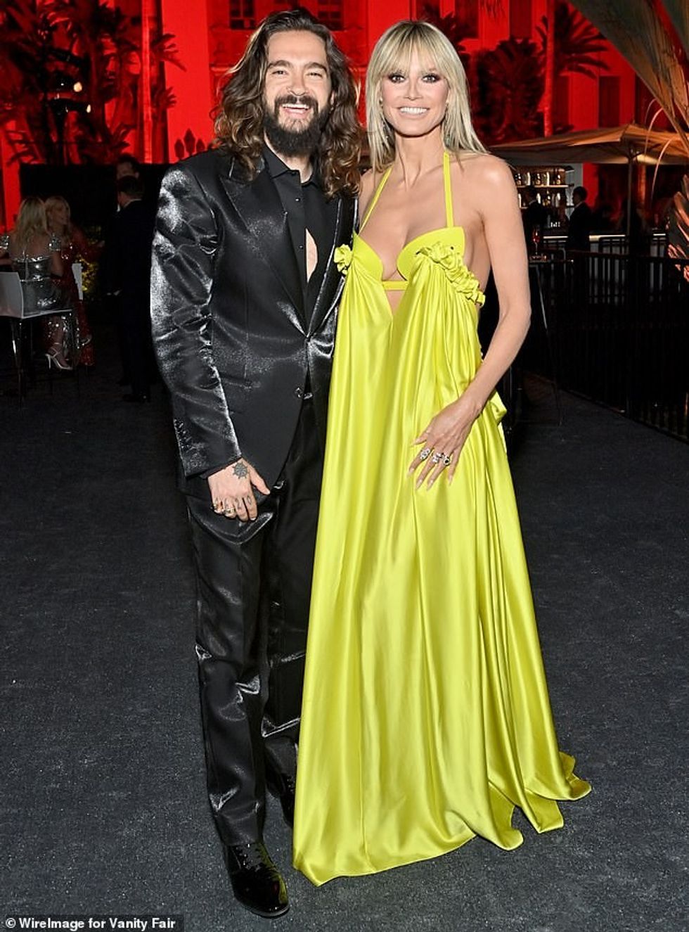 60297655 11016387 Going strong Tokio Hotel guitarist Tom and Heidi shown in March m 61 1657865443132