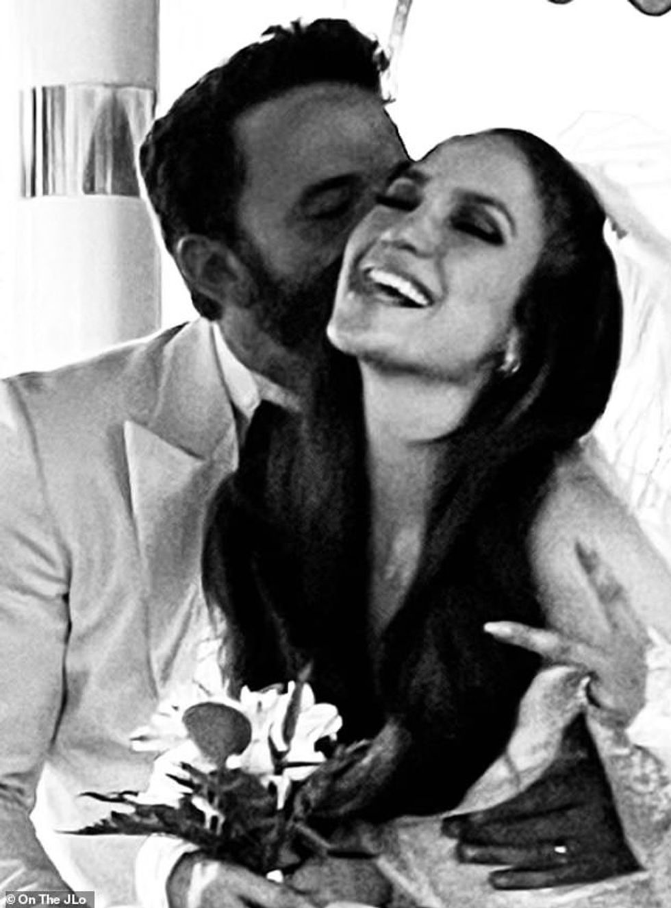 60378051 11023421 Just married The 52 year old multihyphenate and Ben Affleck have a 98 1658114831623