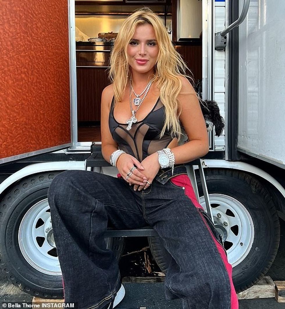 60390561 11023965 Work it Striking a number of different poses the singer worked h m 72 1658140006170