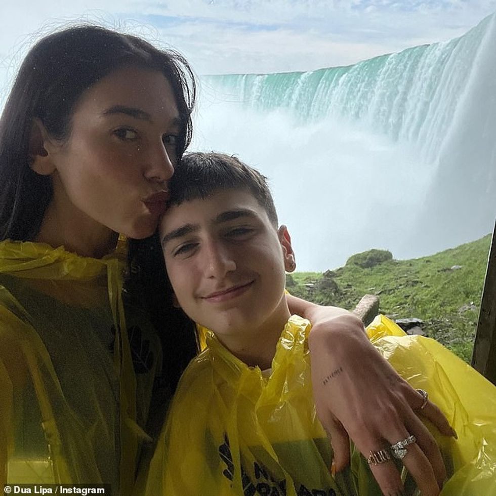 60853149 11063055 Siblings In another snap Dua and her brother donned bright yello a 67 1659124898065