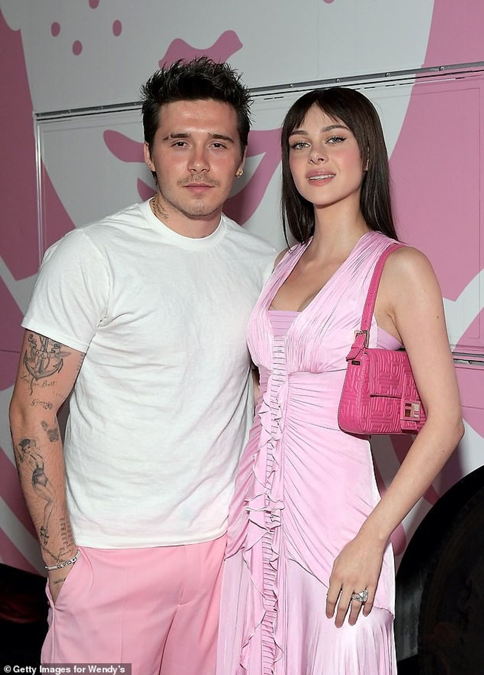 61802543 11153979 Frills Nicola matched Brooklyn in a pastel pink frilly dress tea m 17 1661678078778